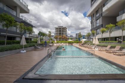 Near Airport Metro 1-bdr Apt Wi-fipoolgym - image 26