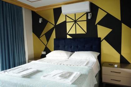 Middle Village Suite Hotel - image 21